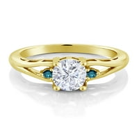 18-karatni prsten od dragog kamena od žutog zlata obložen srebrnim plavim dijamantom i moissanitom